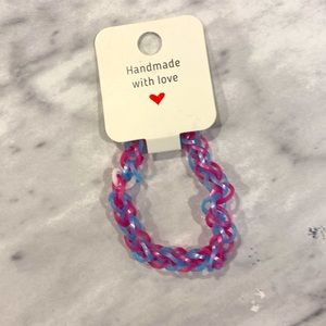 Kid’s size, pink and blue bracelet.